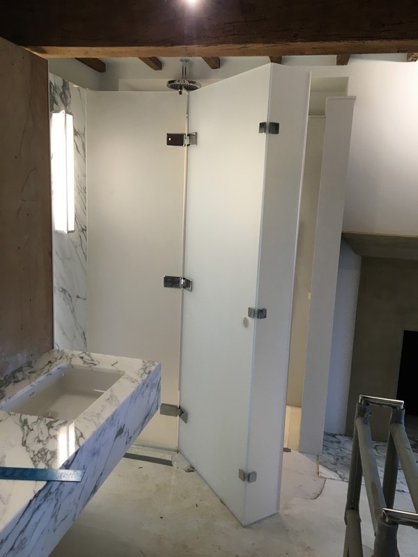 Bespoke frosted glass shower enclosure in Clapton luxury bathroom
