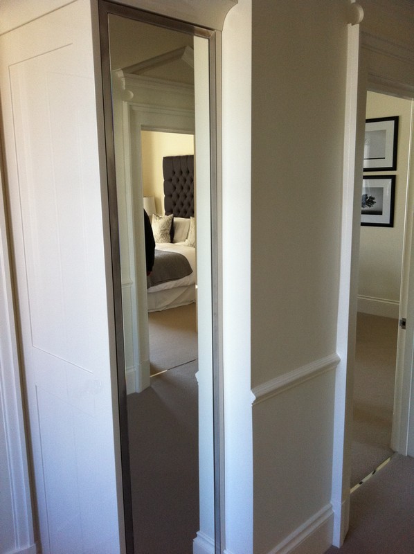 Full-length wardrobe mirror fitted in Clapton home